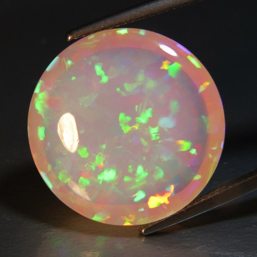 Impresionante Piedra Preciosa Redonda 25.63Cts Color Natural Play Blanco Ópalo 21.6mm Ref-VIDEO! - Imagen 5 de 5