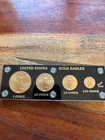 2002 1 oz + 1/2 oz + 1/4 oz + 1/10 oz Gold American Eagle 4 coin set in display