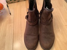 geniune ugg boots. New and unworn. Dark brown.