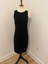 Halston Heritage black dress. Sleeveless with a faux wrap skirt SZ 8
