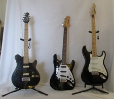 3 Guitars Stands And Accessories
