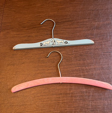 2 VTG Child  s Pink, Blue Wood Clothes Hangers. Dogs with Balls on blue. Swivel