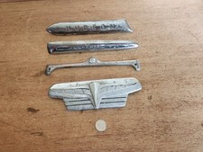 Hudson 210623 Emblem 213598 Commodore 213594 Radio Delete Plate 213590 Dash Trim