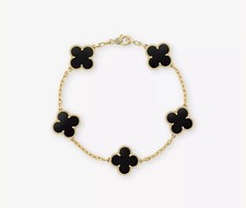 Beautiful Gold and Black 5 motif bracelet with box and packaging!19cm , 5 clover
