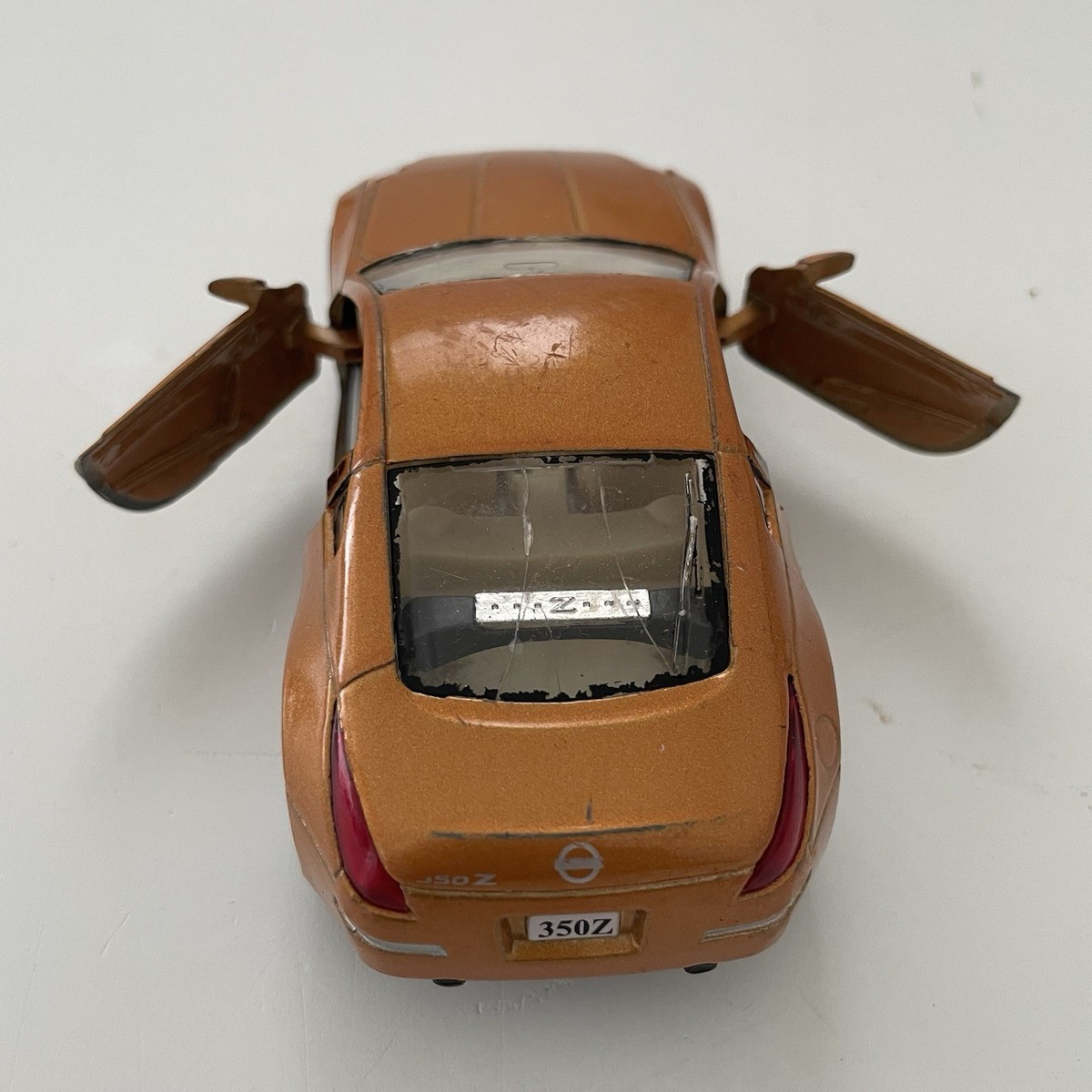 Kinsmart Nissan 350Z Diecast Model Car 1:36 Scale Orange Pullback