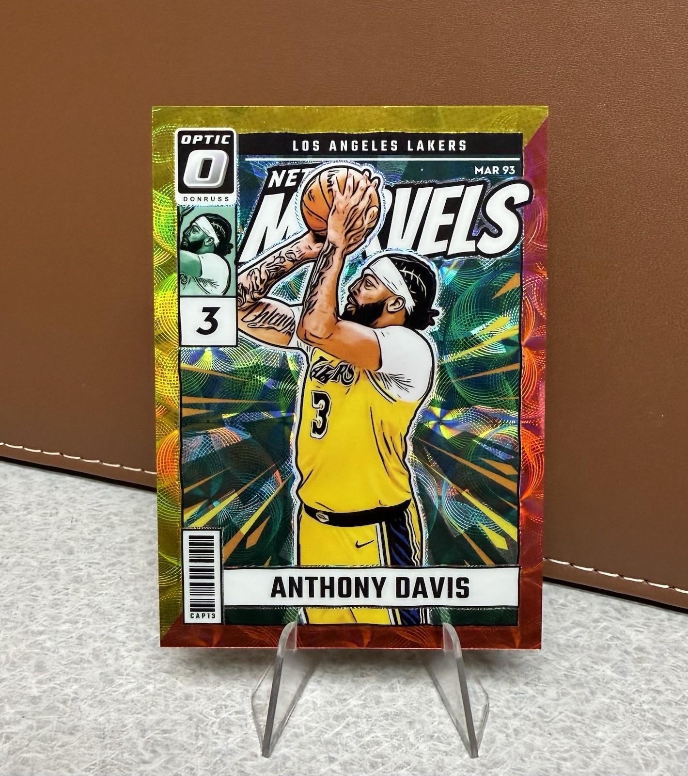 Anthony Davis 2024-25 Donruss Optic - Net Marvels Intl. Gold & Red /99 Lakers #5