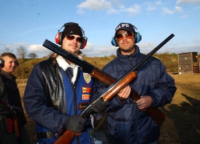 Kid Rock and Carson Daly at shooting range at Ramstein Air Base in- Old Photo