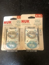 Two packs of two- Nuk Orthodontic Shape Pacifiers, 6-18 Months, W/Case