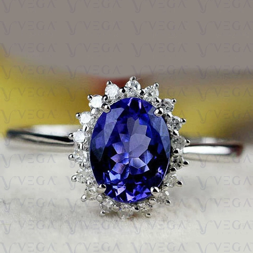 Anillo con halo de diamantes y tanzanita natural de corte ovalado de 4,40 quilates enchapado en platino 950PT Foto 3 de 4