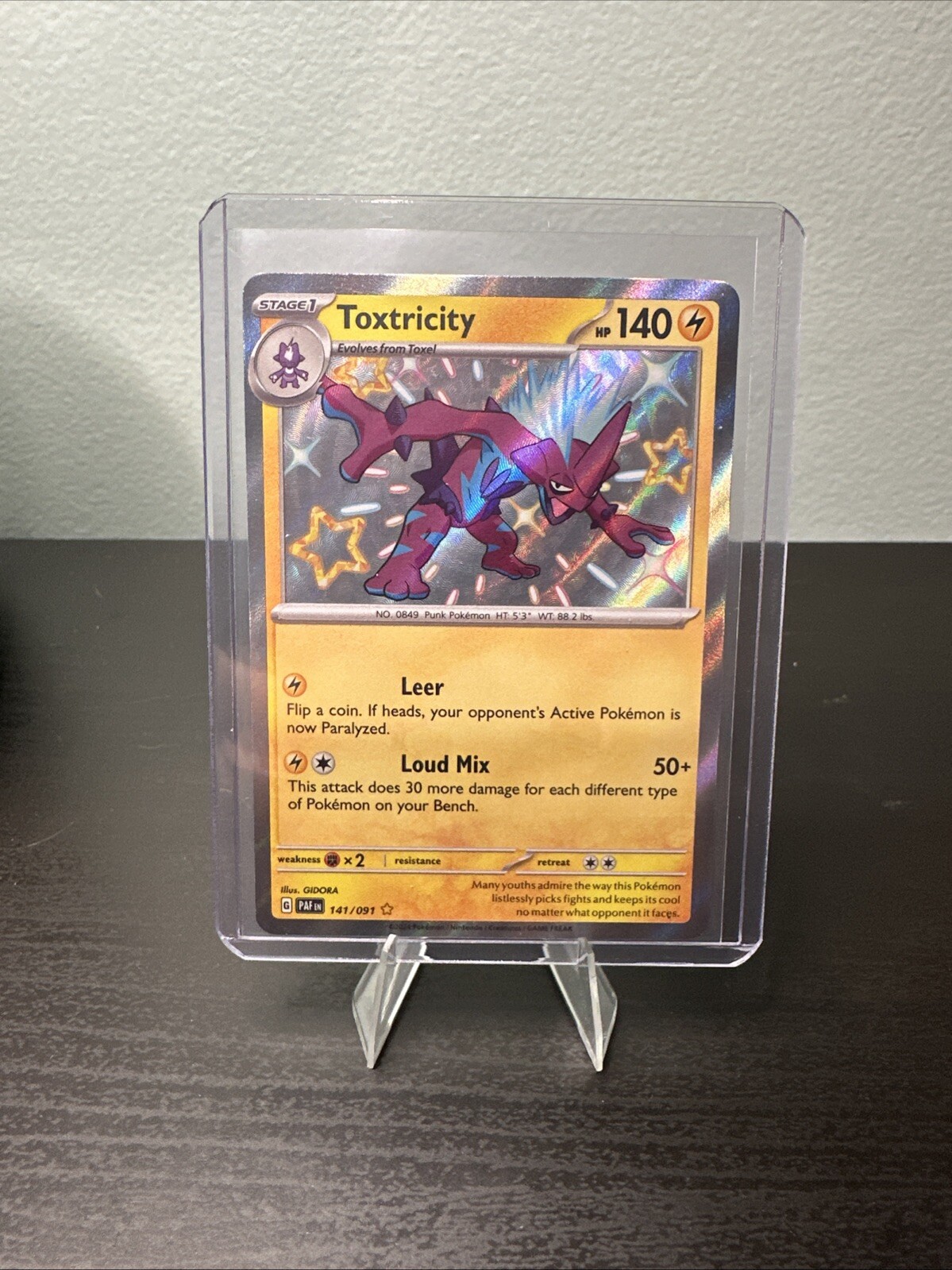 Toxtricity 141/091 Sv: Paldean Fates Holo