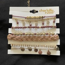 Charlotte Russe gold and purple beaded clasp bracelets ankle bracelets set of 7