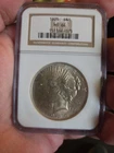 1925 PEACE DOLLAR IN A OLD NGC HOLDER MS64
