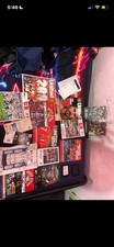 man united football memorabilia with a signed book from players and old tickets