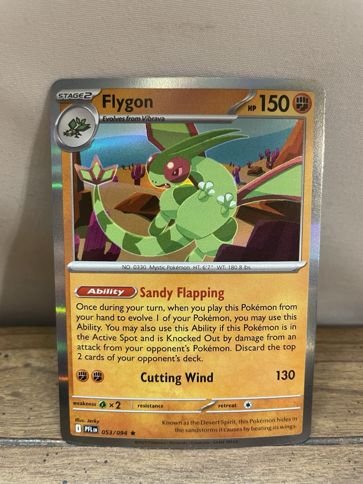 Flygon 053/094 Me02: Phantasmal Flames Holo