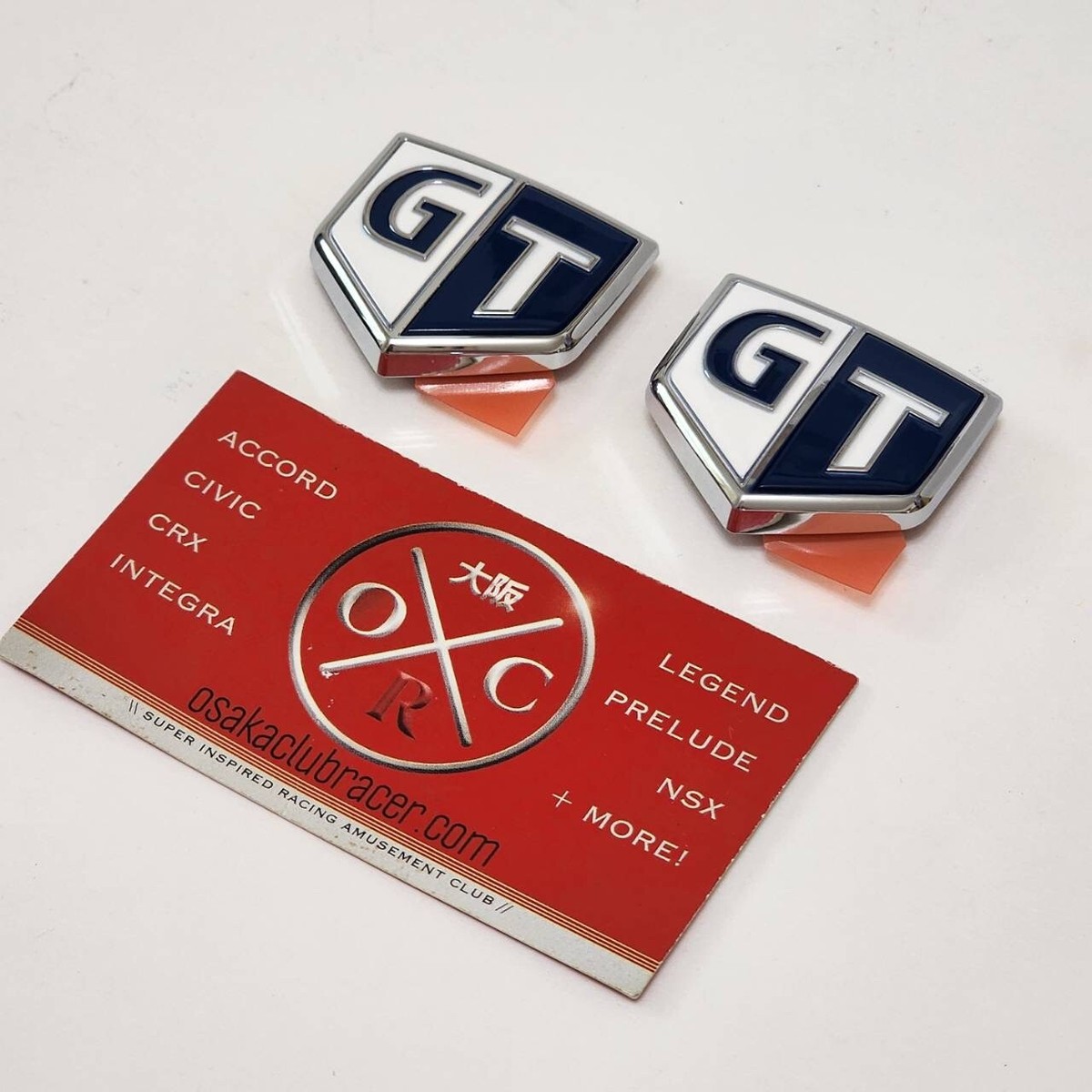 New Genuine OEM R34 Nissan Skyline Fender Emblem Badge Set 2 BLUE