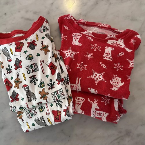 Carter’s size 7 Christmas pajamas - Two Sets