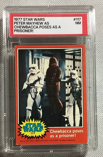 1977 Topps Star Wars #117 Chewbacca poses as a prisoner! — PSA 7