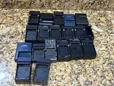 Mixed lot of digital camera chargers Sony Handy Cam Canon Power Shot Nikon Lunix