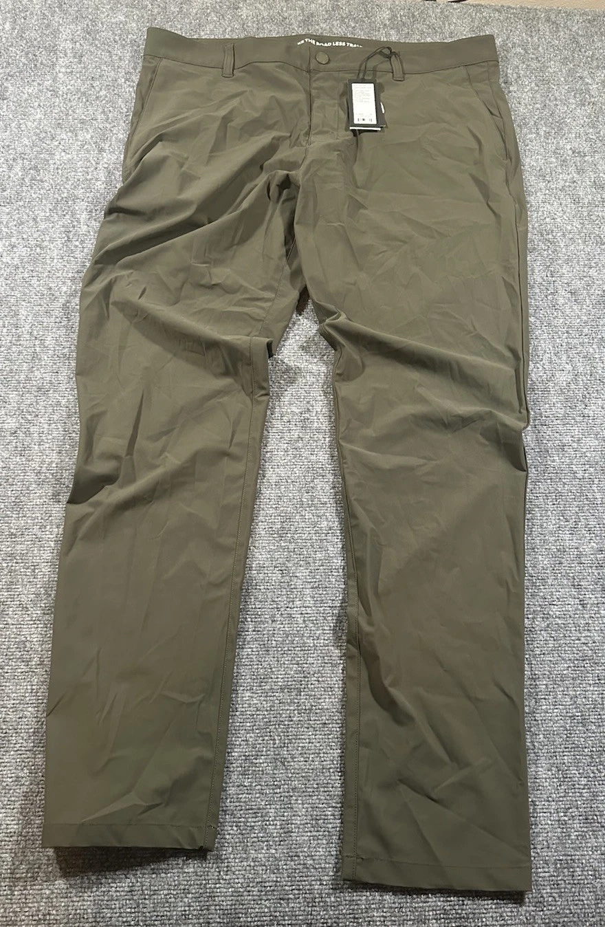 NWT Rhone Men’s 38x33 Resort Slim Pant Stretch Quick Dry Green UPF 50+ 138$