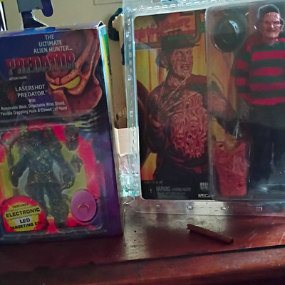 NECA Freddy Krueger Predator Action Figure w/ LED Flashlight, Accessories