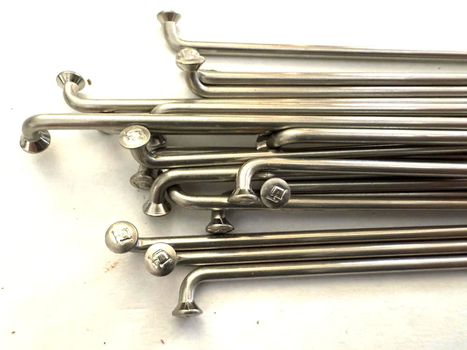 Radios redondos negros DT SWISS Champion plateados curva en J 2,0 mm 284 mm 20/cuenta Foto 2 de 4