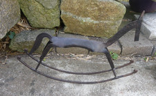 Cheval à bascule vintage en fe…