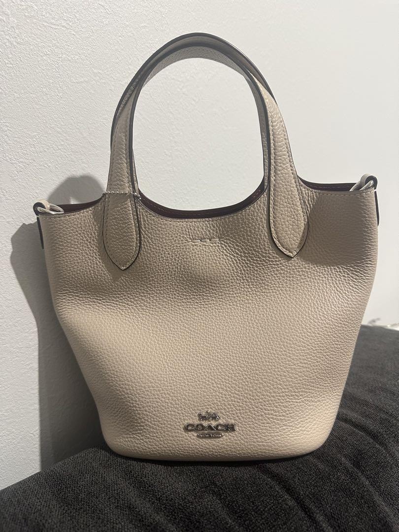 COACH Beige Leather Tote Bag with Gold Accents and Spacious Design