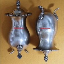 SET SALE IN ARGENTO ANTICO A CONTRASTO MOLTO FORTI. Peso 93 gr. 12 x 40 cm.