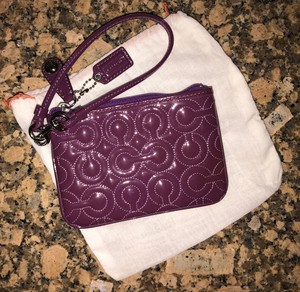 plum clutch