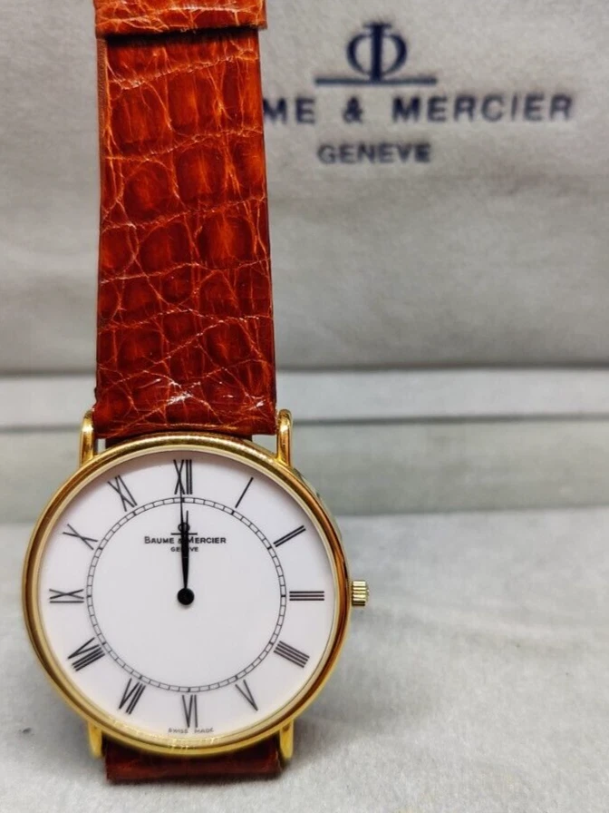 Baume & shop mercier oro