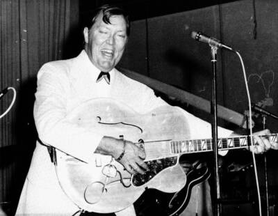 Bill Haley performing on stage with his band The Comets duri- 1957 Old Photo