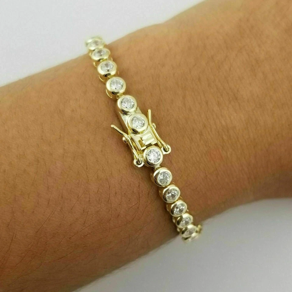 Brazalete Tenis 7" Corte Redondo 7Ct Diamante Simulado Mujer Acabado Oro Amarillo 14K Foto 2 de 4
