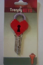 Heart Lock Schlage SC1 house key blank.
