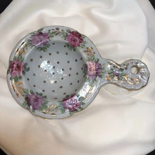 Vintage porcelain tea strainer rose floral w gilding no base