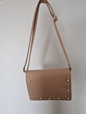 Gorgeous pink hanbag used on. 