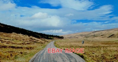 PHOTO  THREE MILES OR SO FROM ALTNAHARRA THE ROAD (A836) FOLLOWS STRATH VAGASTIE