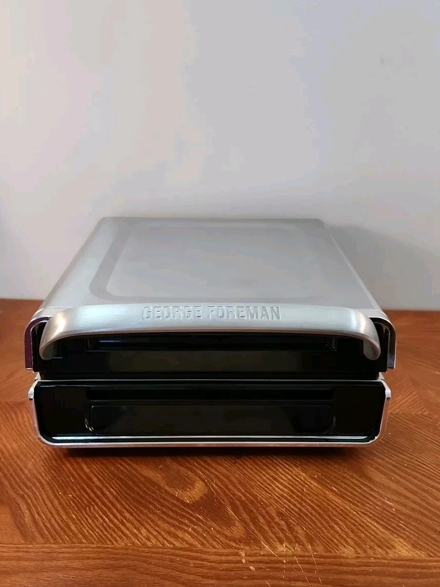 George Foreman Smokeless Grill GRD6090B Panini Family Size Open Box. New
Opens in a new window or ta