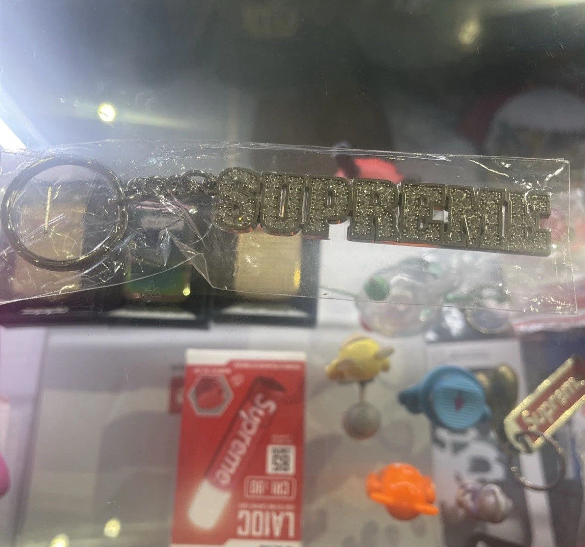Porte clés Suprême