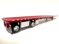 Remolque Wilson de plataforma DCP PRIMERA MARCHA ESCALA 1/64 ROJO, NEGRO, EJE EXTENDIDO