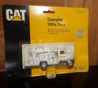 Ertl 1:64 CAT Caterpillar Utility Truck #2411 w/Boom Mint of Card 1991
