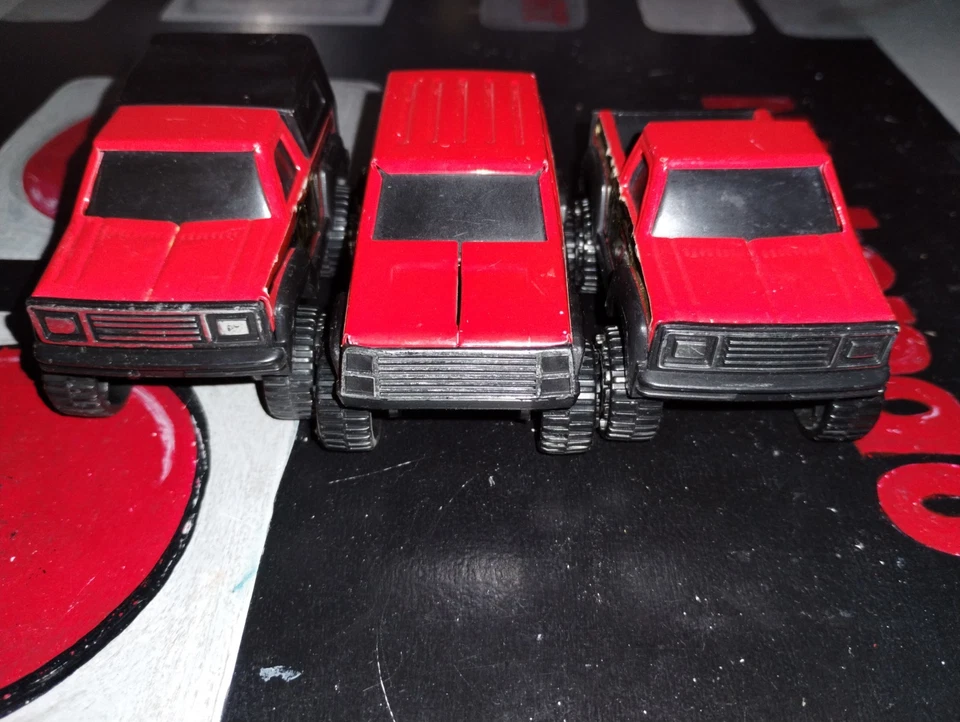 3 camiones Buddy L High Roller #1, #2 y #7 4x4 vintage 1984 juguete de plástico rojo 3,5" Foto 3 de 4