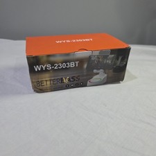 Cell Phone Stand with Wireless Audio Speaker in White.