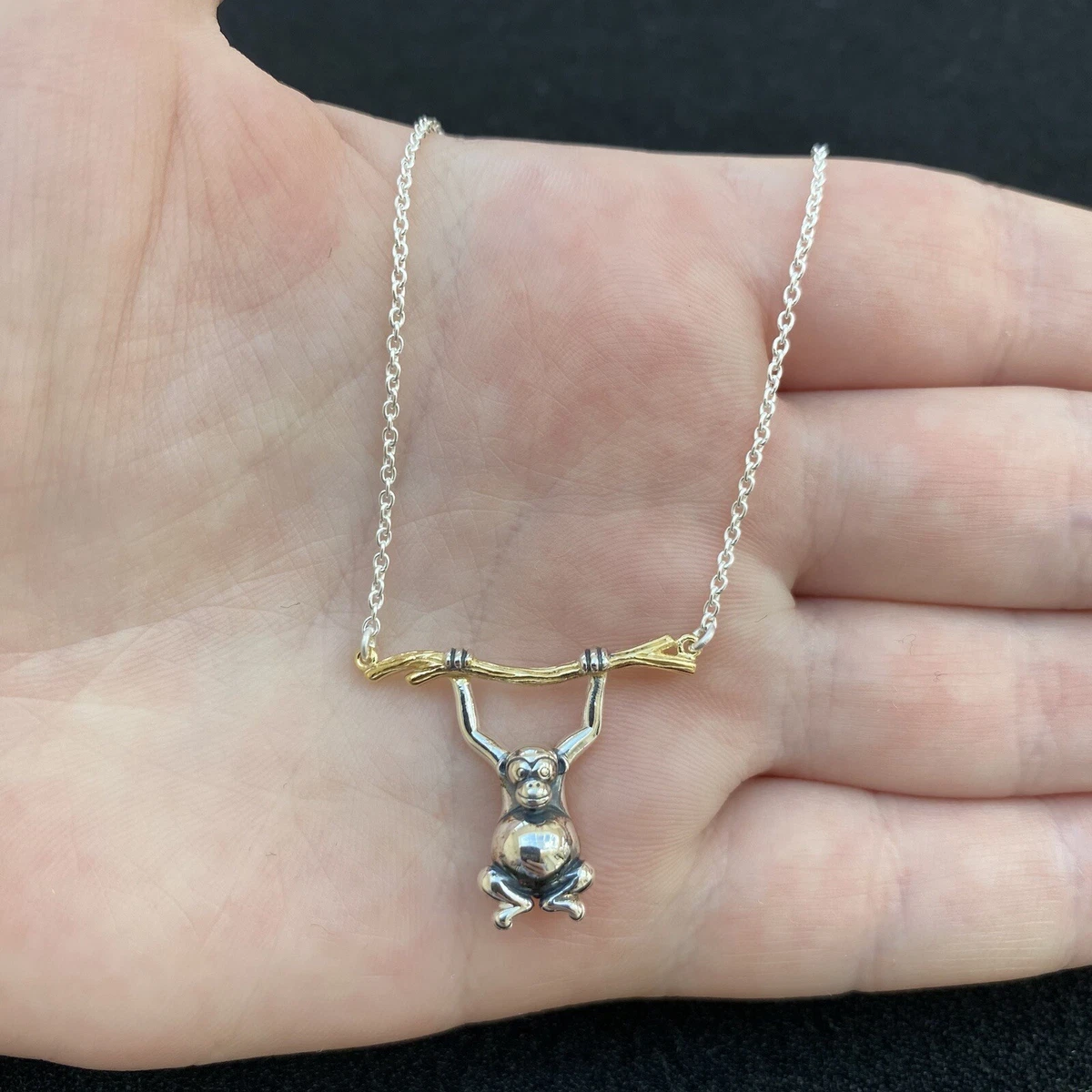 Silver monkey shop pendant