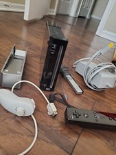 Nintendo Wii COMES WITH REMOTE AND NUNCHUCK