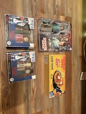 collection of Stranger Things merchandise, including collectible PEZ dispenser