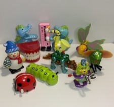 Lot Of 12 Wind Up Toys 70  s 80  s Tomy Papel Saxophone Dorsey Trombone Cat Bugs