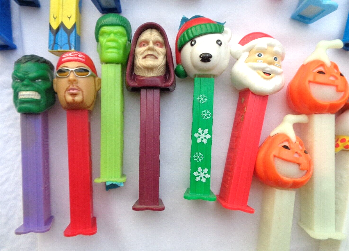 PEZ Candy Dispensers 61 new in package and loose 1963-2016 Read