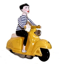 Tin Toy Scooter Girl Windup Tin Toy - Girl on scooter - Scooter - Yellow