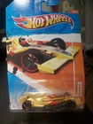 HOT WHEELS TRACK STARS '11 GOLD #8/15 "F1 RACER" W/RED LINE WHEELS