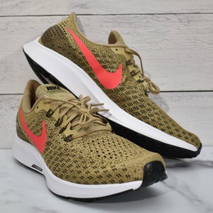 beige nike running shoes